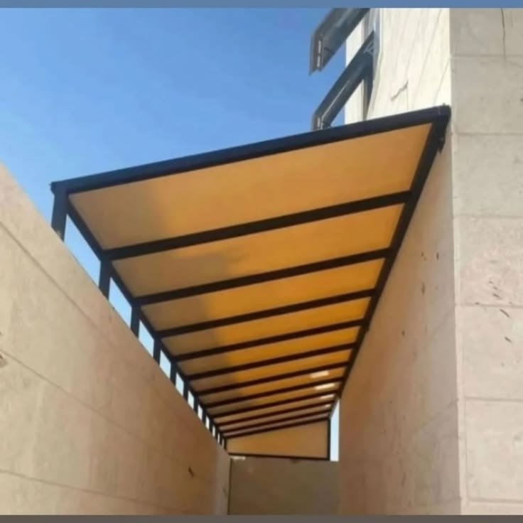 تنفيذ مظلات وتغطية الممرات للمنازل والاستراحات والمنشآت في حي العدل بمكة